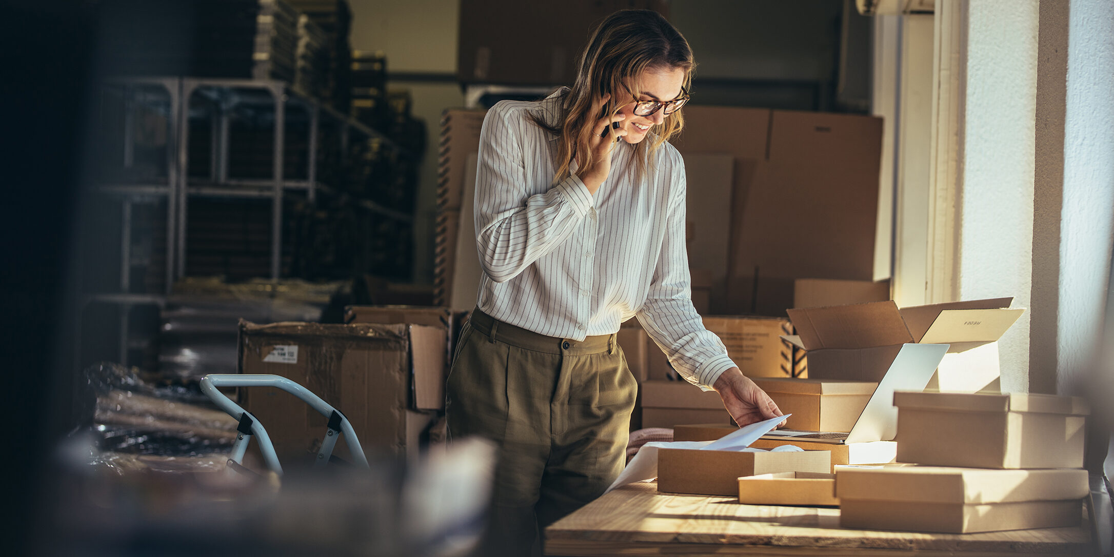 Woman,Online,Seller,Confirming,Orders,From,Customer,On,The,Phone.